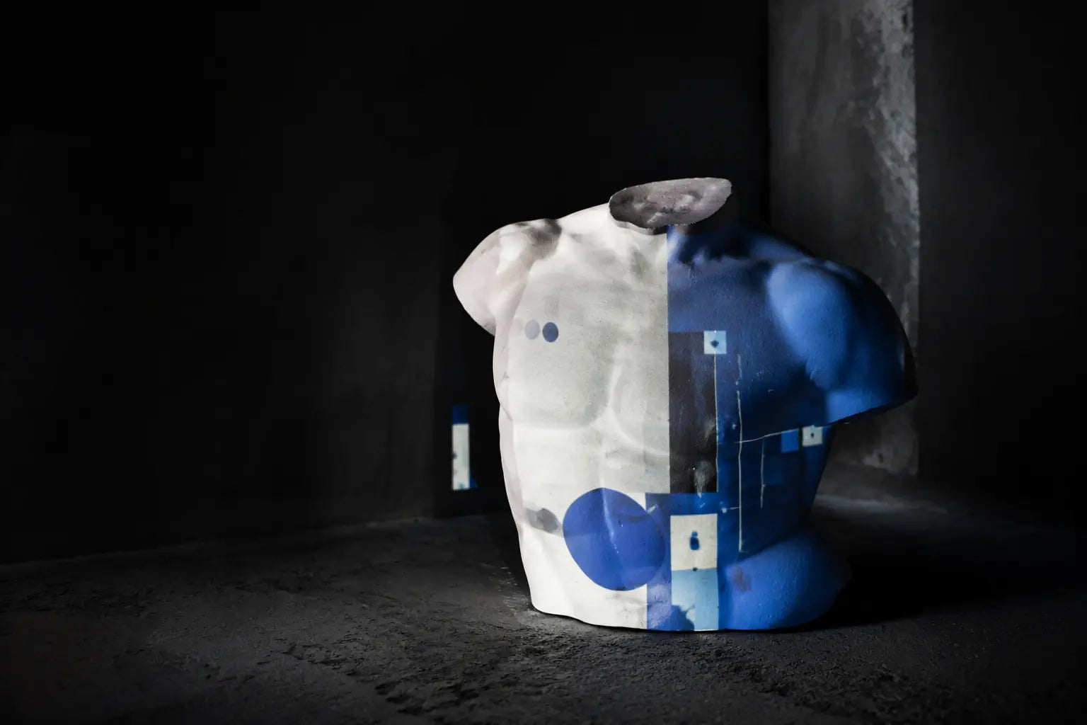A commerce interface projected across a plaster sculpture